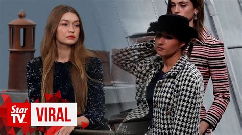 chanel catwalk crasher gigi|Gigi Hadid Stops Runway Crasher At Chanel Show.